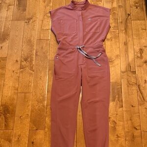 Figs Dusty Rose Jumpsuit Size Small
3 small spots on back in pictures